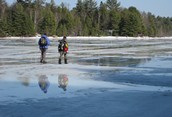 Early Thaw on Frozen Lake